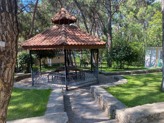 Pavilions and pines in a park in Antalya