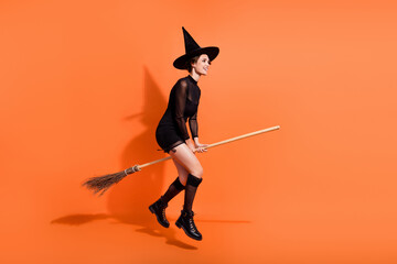 Full size photo of pretty woman flying broom sabbath shopping dressed trendy black halloween...