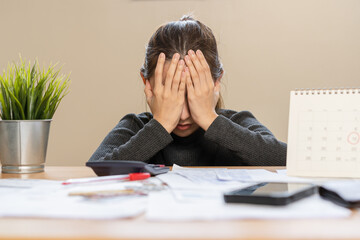 Financial owe asian woman sitting cover face with hands, stressed by calculate expense from invoice...