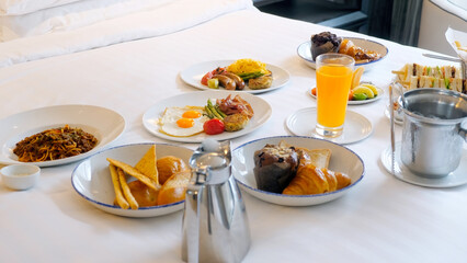 Hotel served food in room. Breakfast in bed in luxurious hotel resort