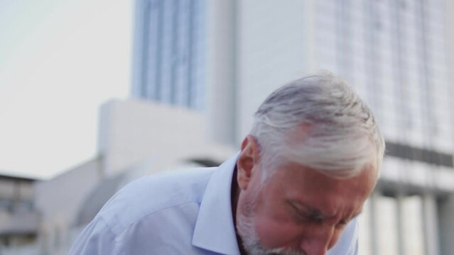 Senior man has strong cough, risk of bronchitis or pneumonia, covid-19 disease