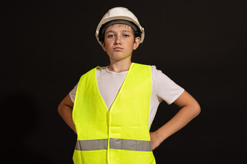 student builder looks proudly into the camera.