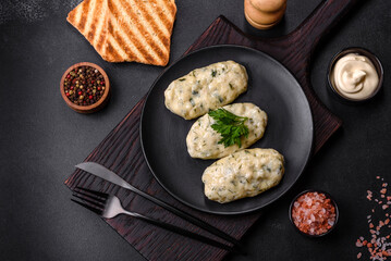 Traditional Lithuanian dish zeppelin, boiled potato dumplings stuffed with minced meat © chernikovatv