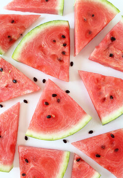 heap of watermelon slices on background