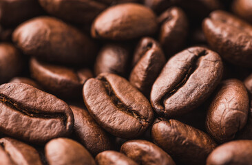 Coffee beans texture close up background.