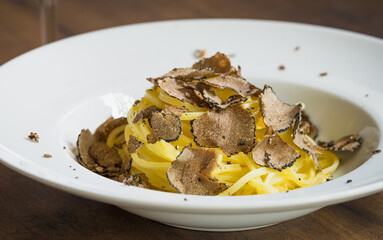 Pasta with fresh truffle mushroom background.Restaurant menu plate background. - 533737887