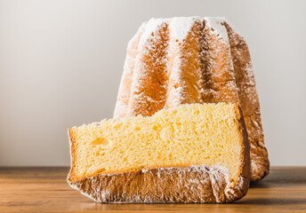 Pandoro cake Christmas Italian traditional sweet bread with icing sugar copy space background.