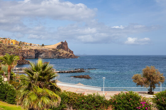 View of the beach promenade and cliffs at Canico, Madeira,  Portugal, Europe