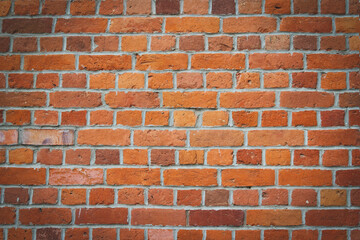 Fototapeta premium High-quality brick texture. Close-up masonry. Red brick wall.