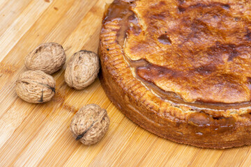 Bündner Nusstorte, or Engadiner Nusstorte,  a traditional sweet, caramelised nut-filled pastry from canton Graubünden in Switzerland. 