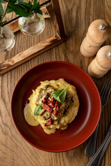 mashed potatoes with beef stroganoff in a beautiful restaurant serving