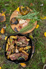 Grilled ribs with garlic peppers and herbs with potato