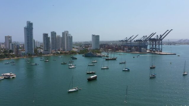 The Cartagena Cargo Port with skyscrapers and marina yacht Colombia Aerial View
