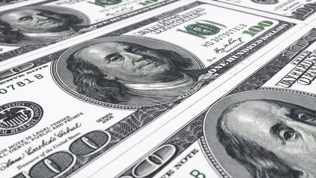 This Stock Motion Graphics Video shows a 100 Dollars Flowing Background on seamless loop.