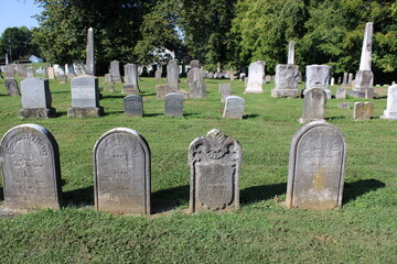 Stone Monuments In A Cemetery.  