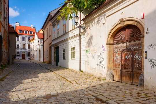 bratislava, slovakia - oct 16, 2019: narrow cobblestone streets of the old city. european vacations in fall season. beautiful architecture on a sunny day