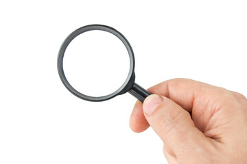 Man's hand with magnifying glass on isolated white background