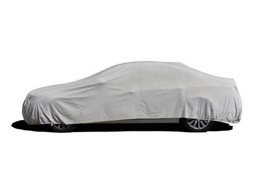 hidden car is covered fabric on isolated background