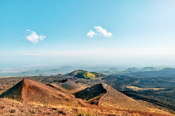 Panoramic wide view of colorful summits of active volcano Etna, Tallest volcano in Continental...