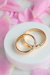Wedding composition with two gold rings.