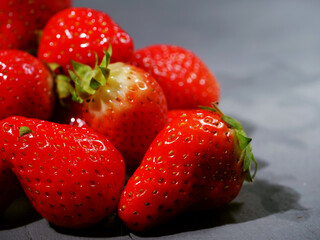 Fresh strawberries ripe for eating close up