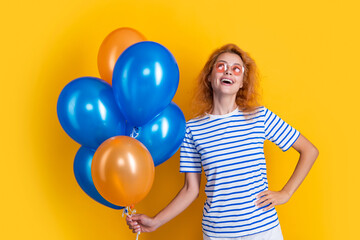 dreamy woman with birthday balloon in sunglasses. happy birthday woman hold party balloon