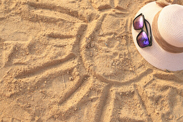 Fototapeta na wymiar hot and glasses on the sand in sea