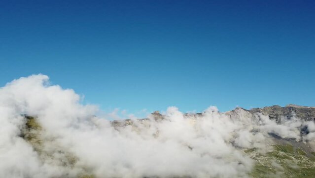 Drone views over 2600m of altitude with waterfalls. French Pyrenes mountains.