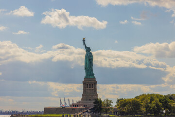 Beautiful view of Statue of Liberty on Liberty island in New York in bay in western Atlantic ocean in Hudson river delta.