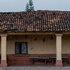 Old house with wooden bench