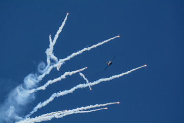 Jet plane in the sky Flare show, Airshow 