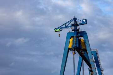 blue shipyard crane in harbor 