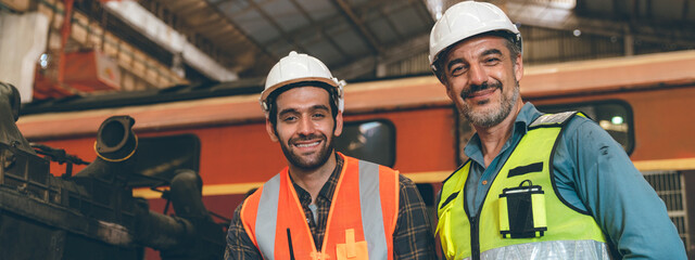 professional industrial engineers in hard hats. working at heavy industry manufacturing factory,...