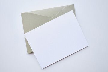 Paper envelopes on a light background. New mail, write a message. Send and receive mail. Postal delivery service. Empty envelope, empty space. Communication with people, paperwork. Envelope close-up
