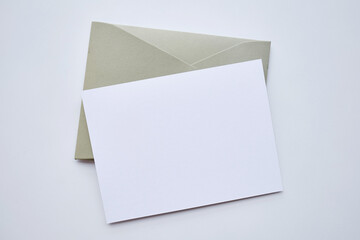 Paper envelopes on a light background. New mail, write a message. Send and receive mail. Postal delivery service. Empty envelope, empty space. Communication with people, paperwork. Envelope close-up