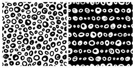 Set of monochrome, hand drawn random and horizontal circles seamless repeat pattern. Vector, scribbled round geometrical shapes all over surface prints in black and white.