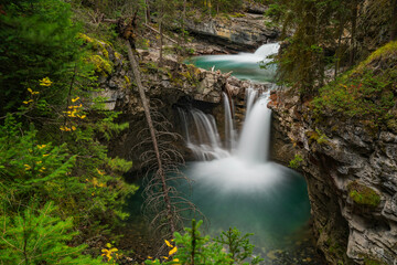Johnston Canyon is a canyon with 2 waterfalls. Johnston Canyon is in Banff National Park.