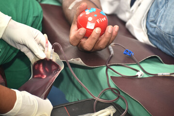 A person Donating blood and a nurse collecting it. There&rsquo;s no end to the benefits of donating blood for those who need it. According to the American Red Cross, one donation can save as many as three l