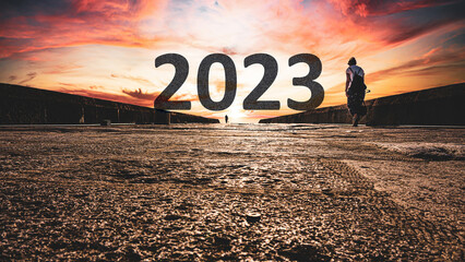 Happy New Year 2023 anniversary. Transition from 2022 to new year. New year concept with the year...