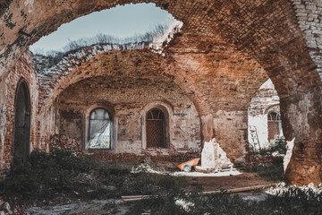 Fototapeta na wymiar interior interior of an abandoned red brick building, abandoned church