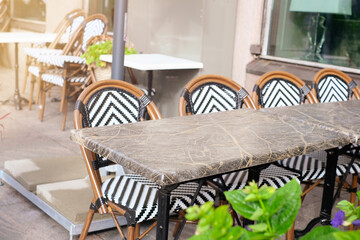 Summer terrace of the restaurant on a clear day. Table near the restaurant close-up
