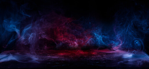 Obraz na płótnie Canvas Panoramic view of the abstract fog. Red and blue cloudiness, mist or smog moves on black background. Beautiful swirling blue smoke. Mockup for your logo. Wide angle horizontal wallpaper or web banner.