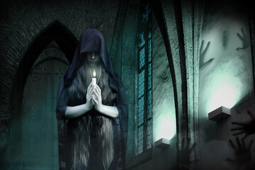 young female witch, black lady with long hair holds candle in her hands, stands at the window of an...
