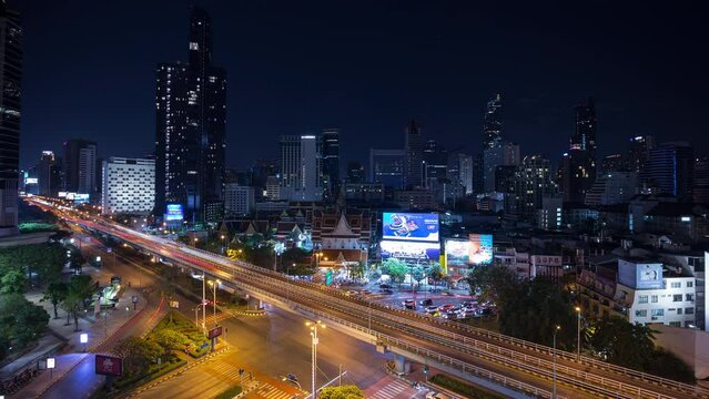 night illumination bangkok cityscape downtown traffic street crossroad rooftop panorama 4k timelapse thailand 