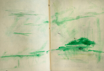 Abstract drawings in the notebook pages.