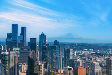 Fototapeta na wymiar Panoramic Seattle financial district skyline in city downtown with Mount Rainier in the background.