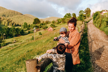 Family vacation in the mountains in summer. Enjoy the sunset in the mountains with the whole family.