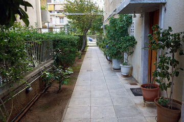 Fototapeta na wymiar Entrance pathway to a building in Palaio Faliro, Athens.