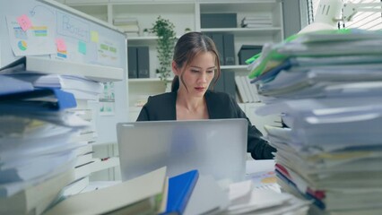 Asian beautiful businesswoman thinking of problem solution in office. 