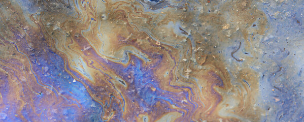 spilled gasoline rainbow background, industrial hazard spill pollution, abstract texture multicolored